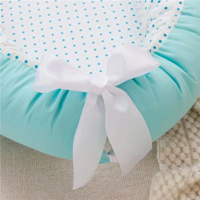 Réducteur de lit bébé | Cocon Sécurité - Zoombébé