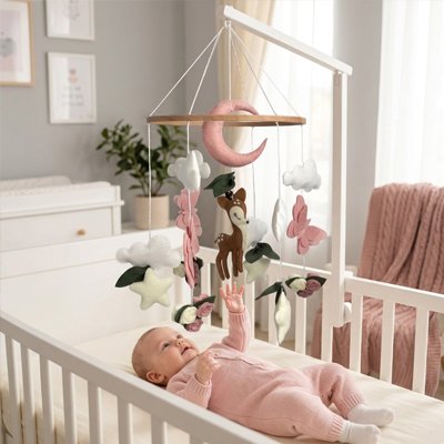 bebe qui touche Mobile bébé