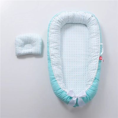 Réducteur de lit bébé | Cocon Sécurité - Zoombébé