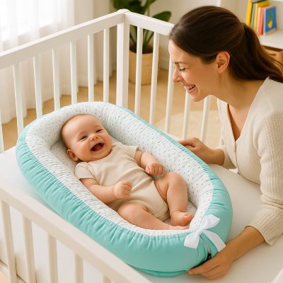 Réducteur de lit bébé | Cocon Sécurité - Zoombébé