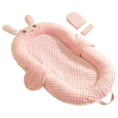 réducteur de lit bébé rose