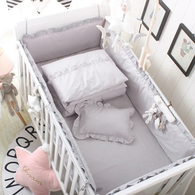 tour de lit bébé gris