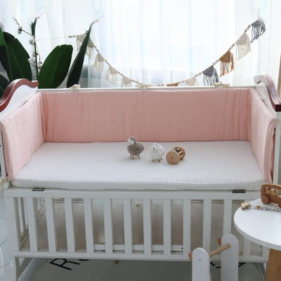 tour de lit bébé rose uni